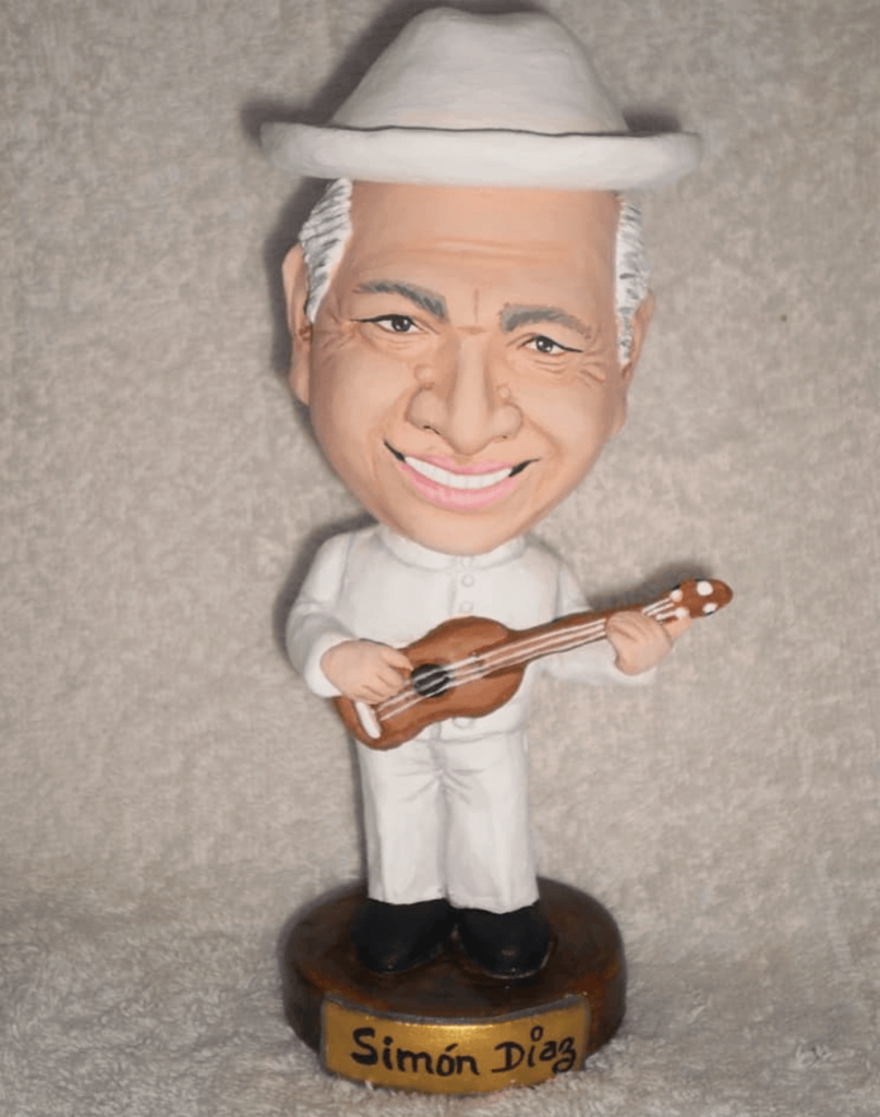 Escultura 3D de Simón Díaz tocando el cuatro - Artesanía Rueda
