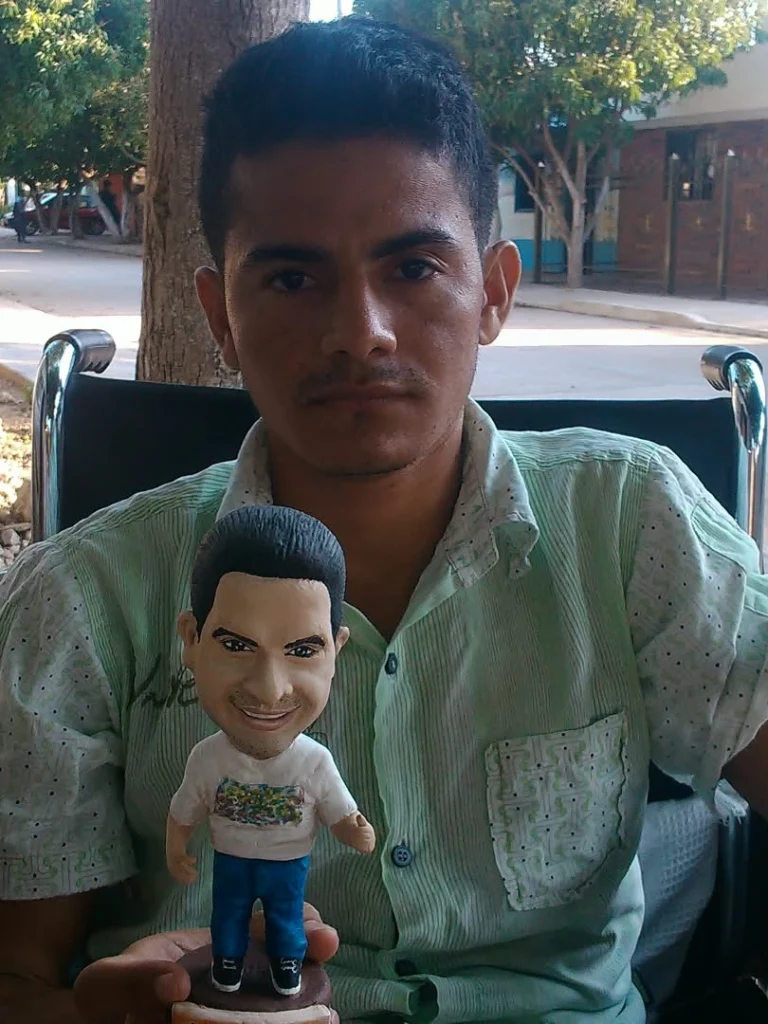 Figura decorativa y caricatura deportiva de Jefatson J. García G. hecha por José Rueda.